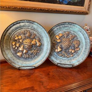 Pair of vintage Peerage brass wall plates with an embossed fruit motif